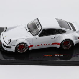 1.43 IXO Porsche RBW 964  White colour with red stripe and red wheels ( MOC305 )